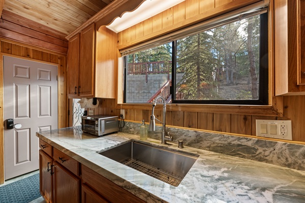 Deep basin kitchen sink and a nice view