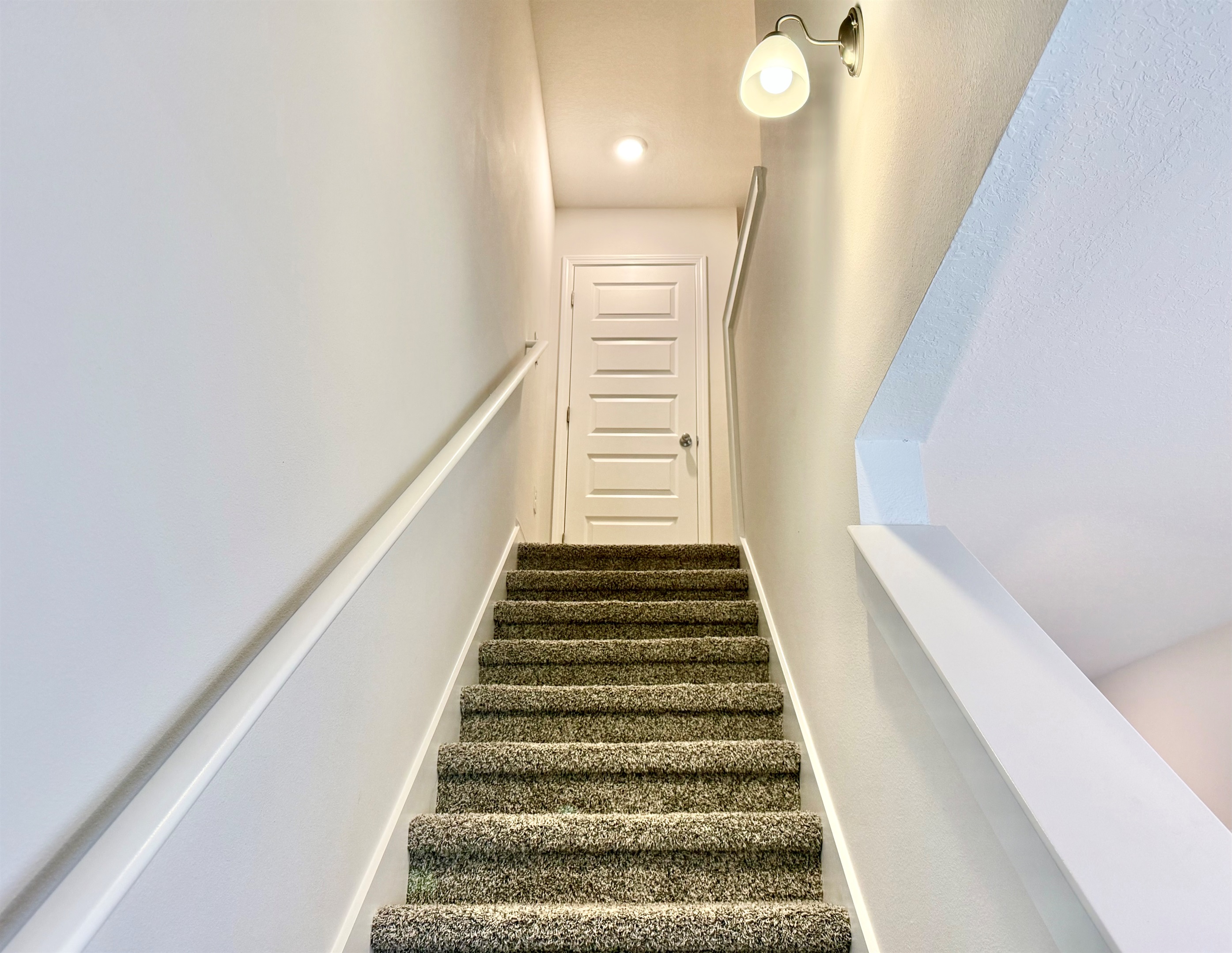 One flight of stairs up to the bedroom level