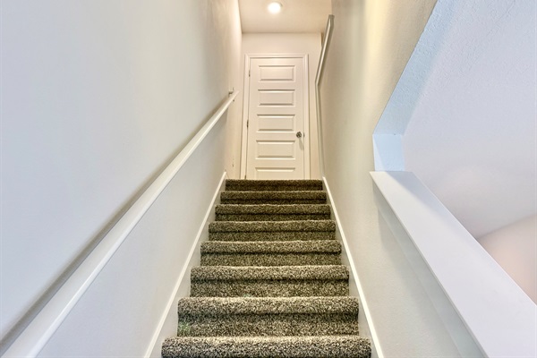 One flight of stairs up to the bedroom level