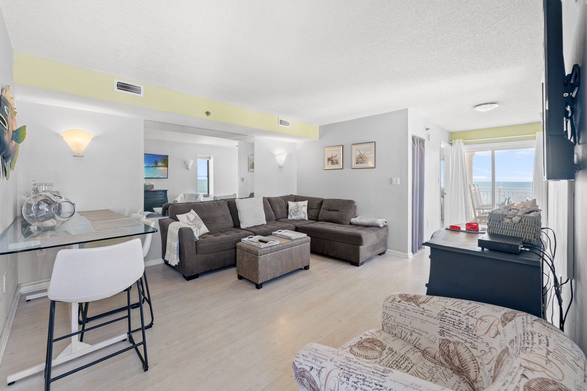 Spacious living room area with balcony access
