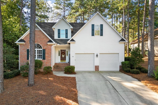 Peaceful Pinehurst retreat surrounded by towering pines.