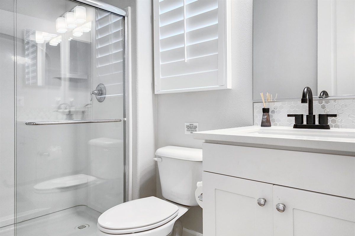 Bathroom #1 - first floor primary ensuite with walk in shower. 