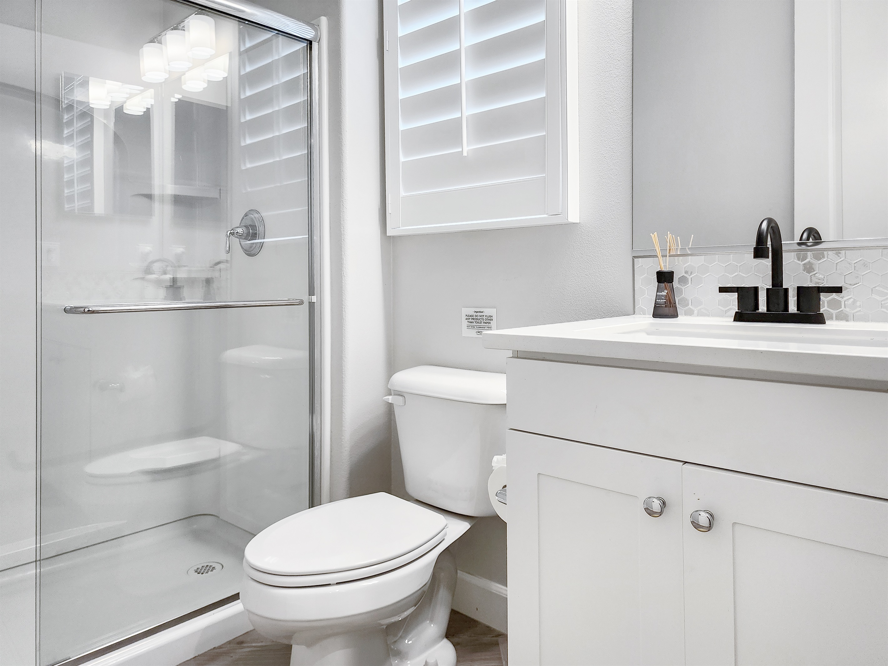 Bathroom #1 - first floor primary ensuite with walk in shower. 