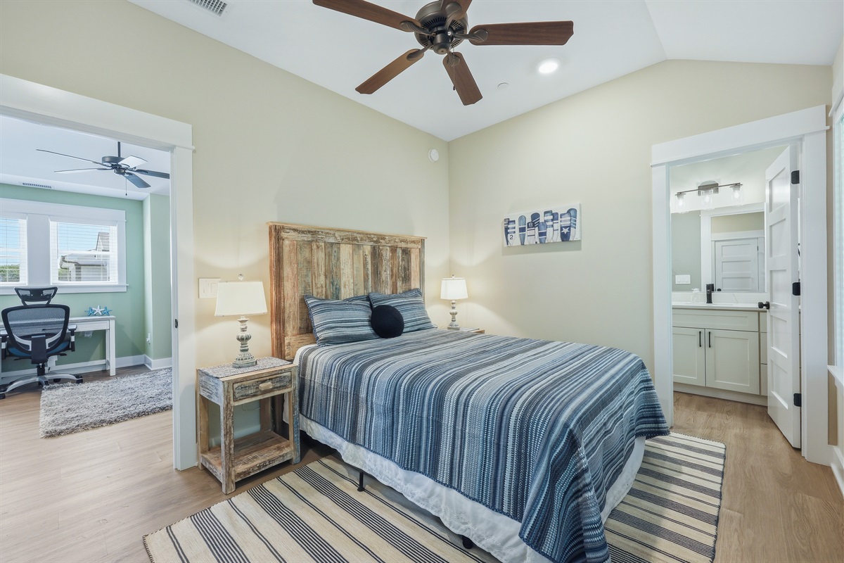 Queen bedroom featuring private ensuite bathroom and comfortable layout