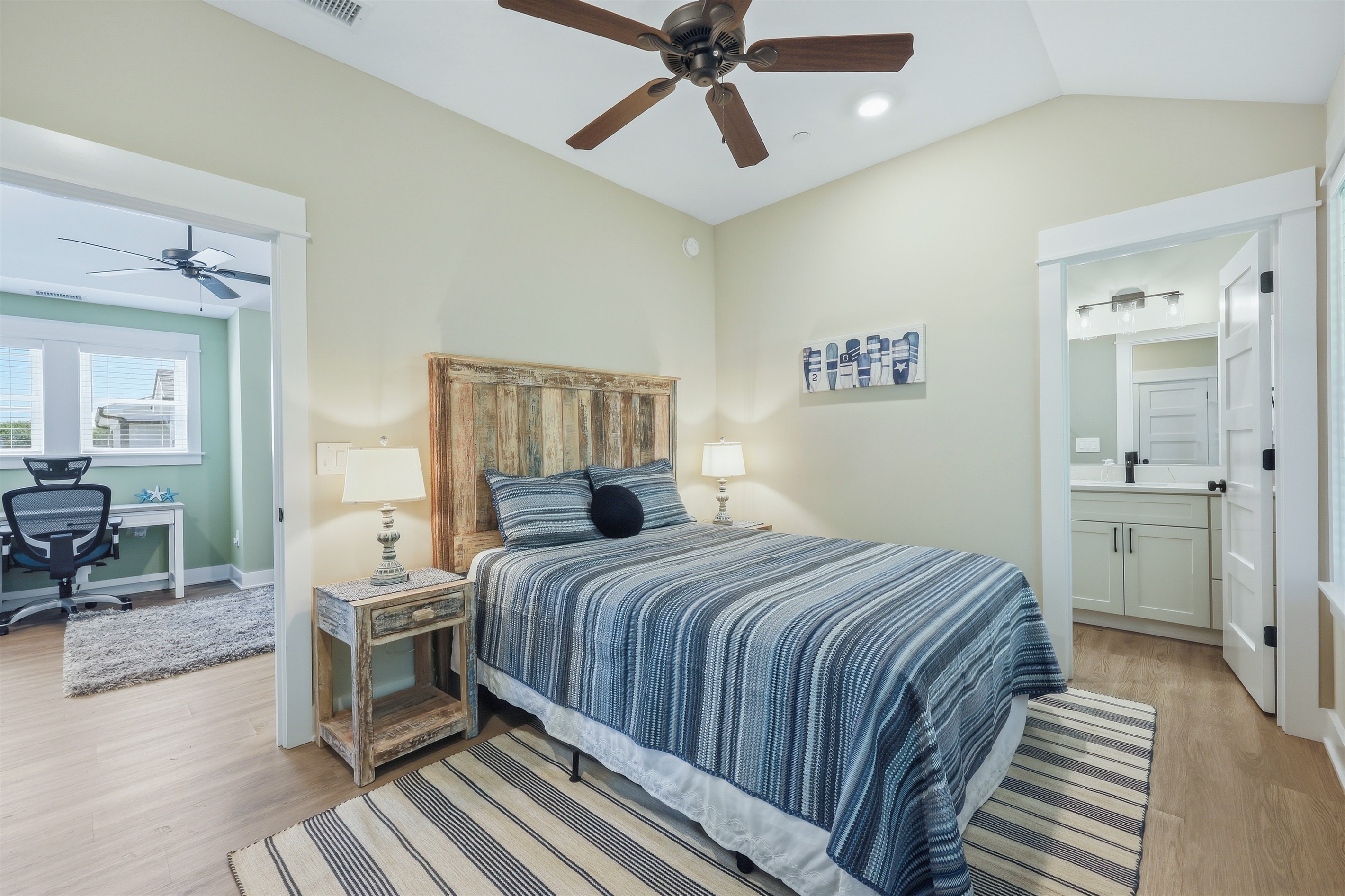 Queen bedroom featuring private ensuite bathroom and comfortable layout
