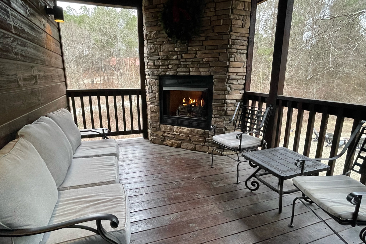 No matter what the weather is like, you will absolutely love the peacefulness of the back patio overlooking the back yard fire pit and gaming area.