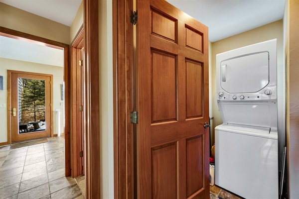 First floor utility room with compact washer/dryer.