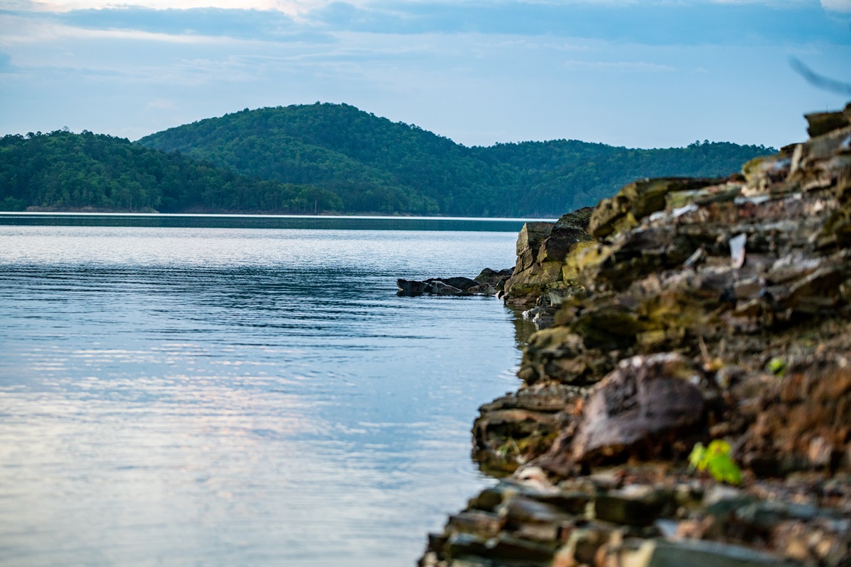 Broken Bow lake is full of coves and lush greenery along the bank.