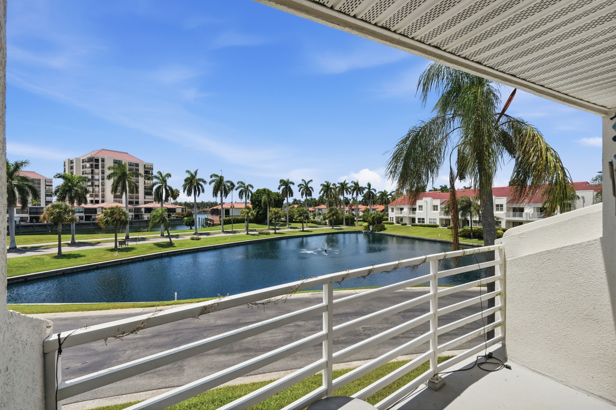 Step outside onto your private balcony and enjoy peaceful pond and waterfront views. It's the perfect spot to sip your morning coffee, relax with an evening drink, or simply take in the tranquil Florida surroundings.