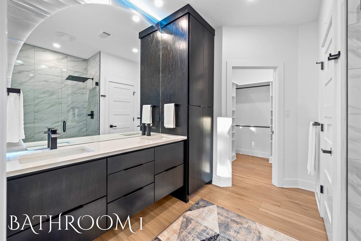 Spa day every day! This bathroom is the epitome of luxury with its sleek design and spacious shower.