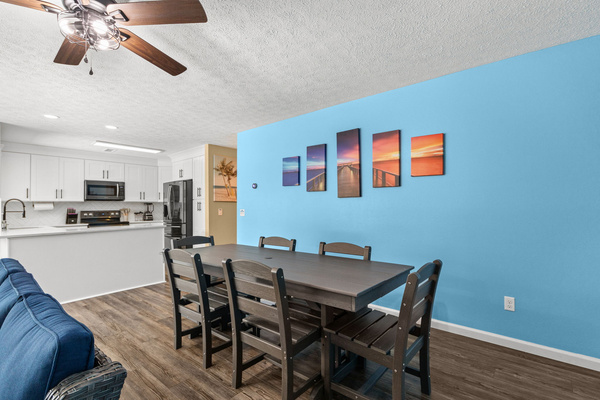 Large dining table with seating for up to 10, perfect for family meals, game nights, and group gatherings.