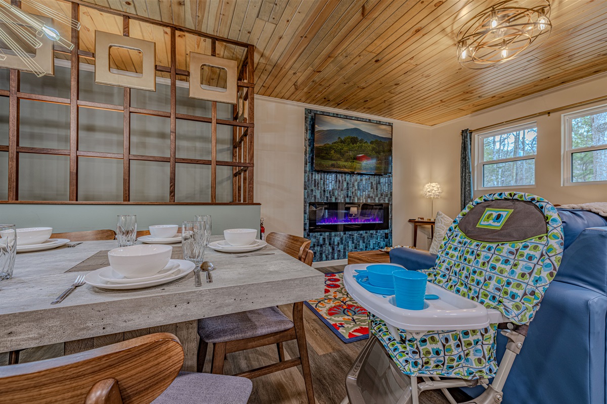 Family-friendly amenities are built-in, including a high chair for the little ones, ensuring everyone has a comfortable seat at the table.