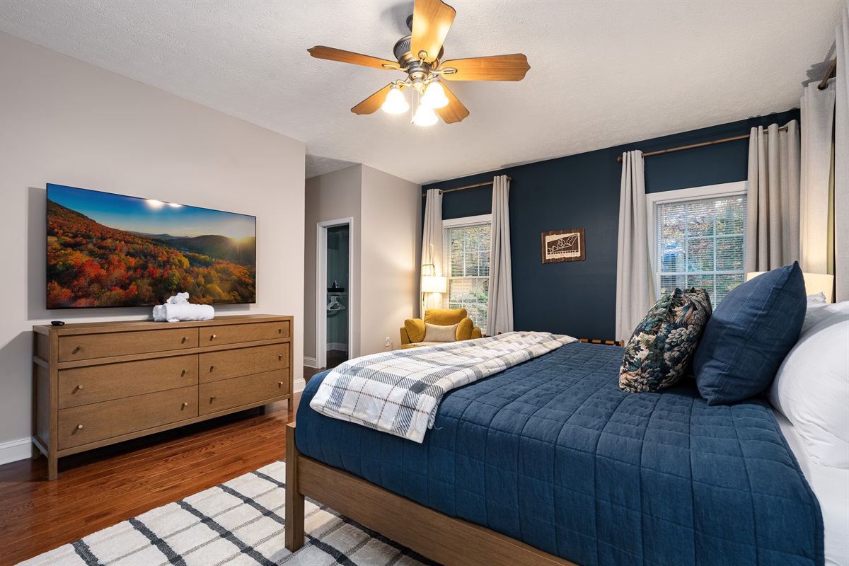 Unwind with a movie from bed — every detail in this king suite was designed for both comfort and style