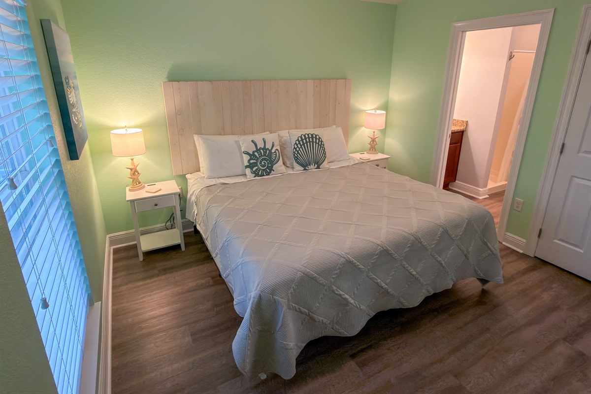 Gentle seaside colors, cozy King bedding, and shell-inspired accents make it easy to settle in and stay awhile.