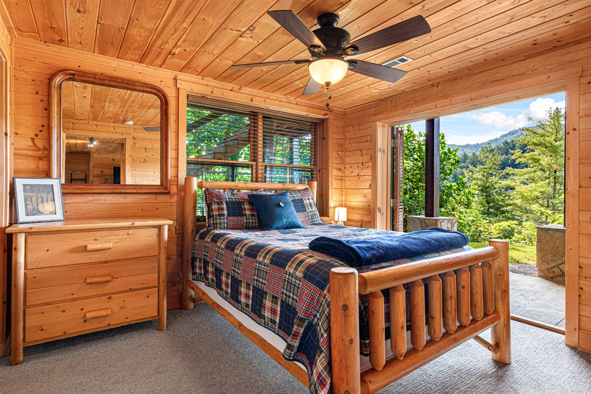 Downstairs Bedroom 2: Scenic serenity with natural light, wooden charm, and mountain-view retreat!