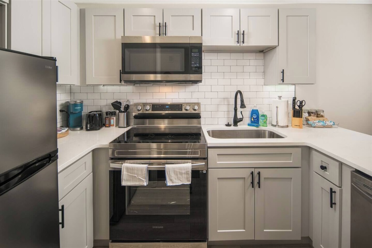 Unit 4: Kitchen with new stainless steel appliances