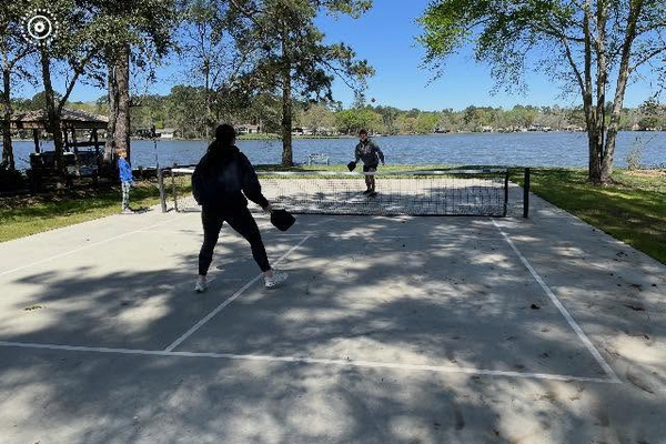 Playing Pickleball on the neighborhood court.
