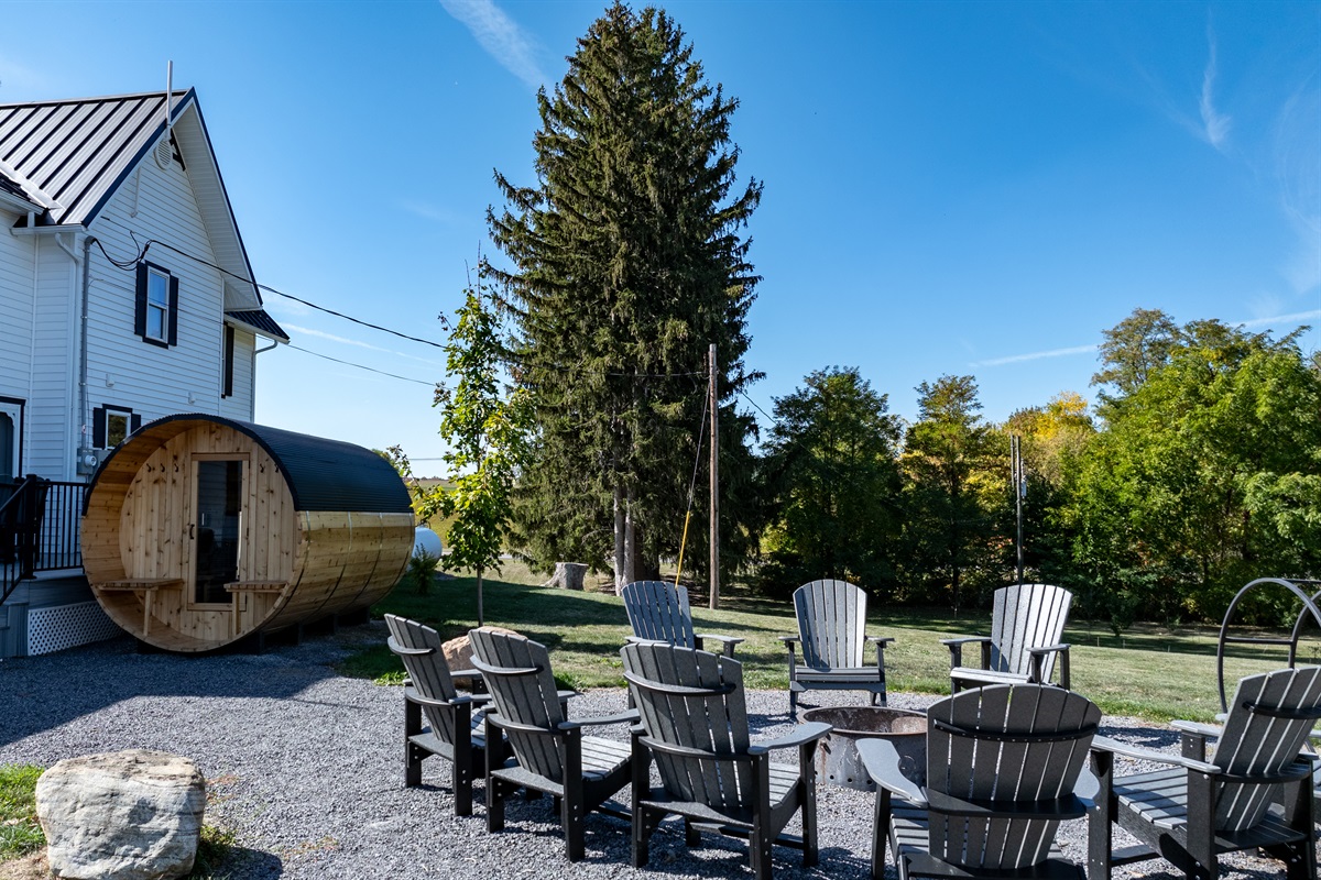 Relax under the stars beside the cozy fire pit or unwind in the private barrel sauna — pure upstate tranquility