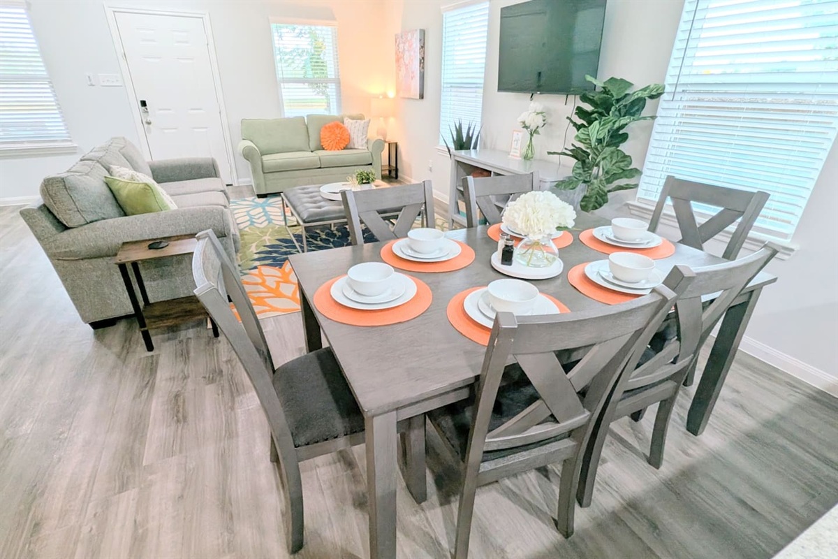 Conveniently located in the open concept living space, this dining space has room for your group. 