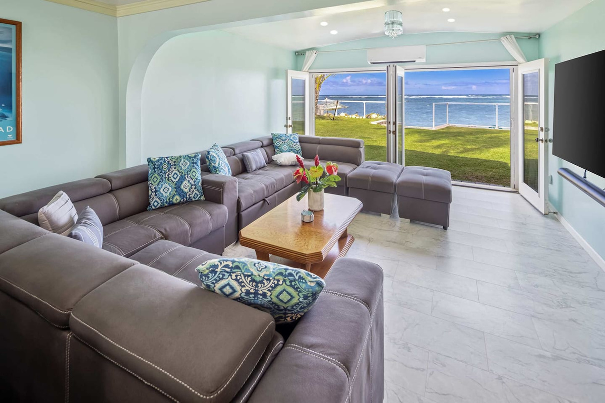 Latest 90-inch 8K resolution most expensive TV & 11.1 channel surround sound home-theater in media room overlooking a Private Beach & beachfront garden just 60 feet from a crystal clear Hawaiian ocean. You cannot even dream this setup into existence
