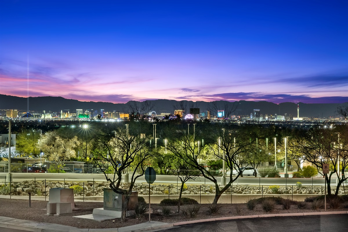 A distant view of the Las Vegas Strip  and Mount Charleston from 2 bedrooms upstairs!  -It's Showtime!