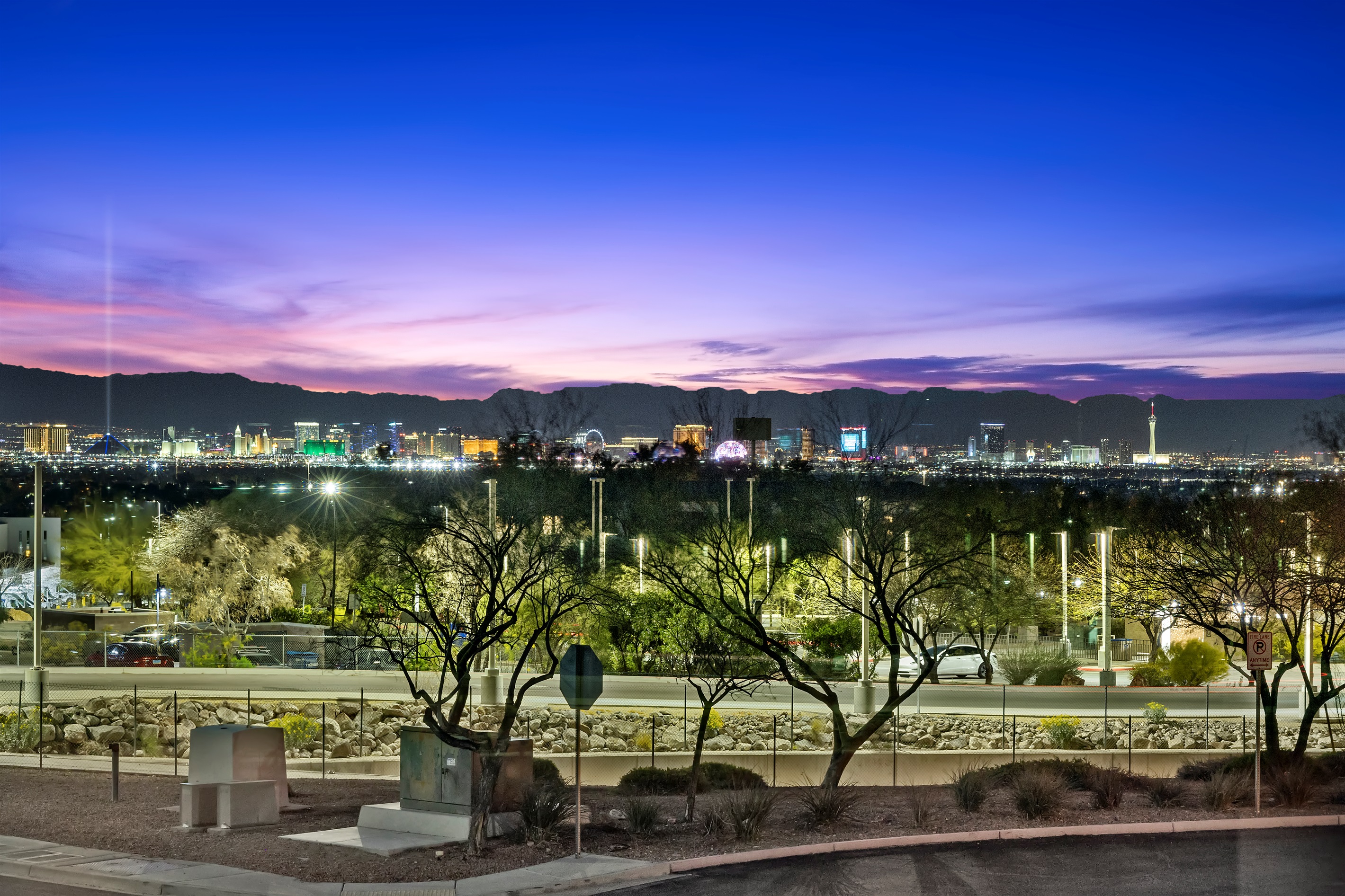 A distant view of the Las Vegas Strip  and Mount Charleston from 2 bedrooms upstairs!  -It's Showtime!