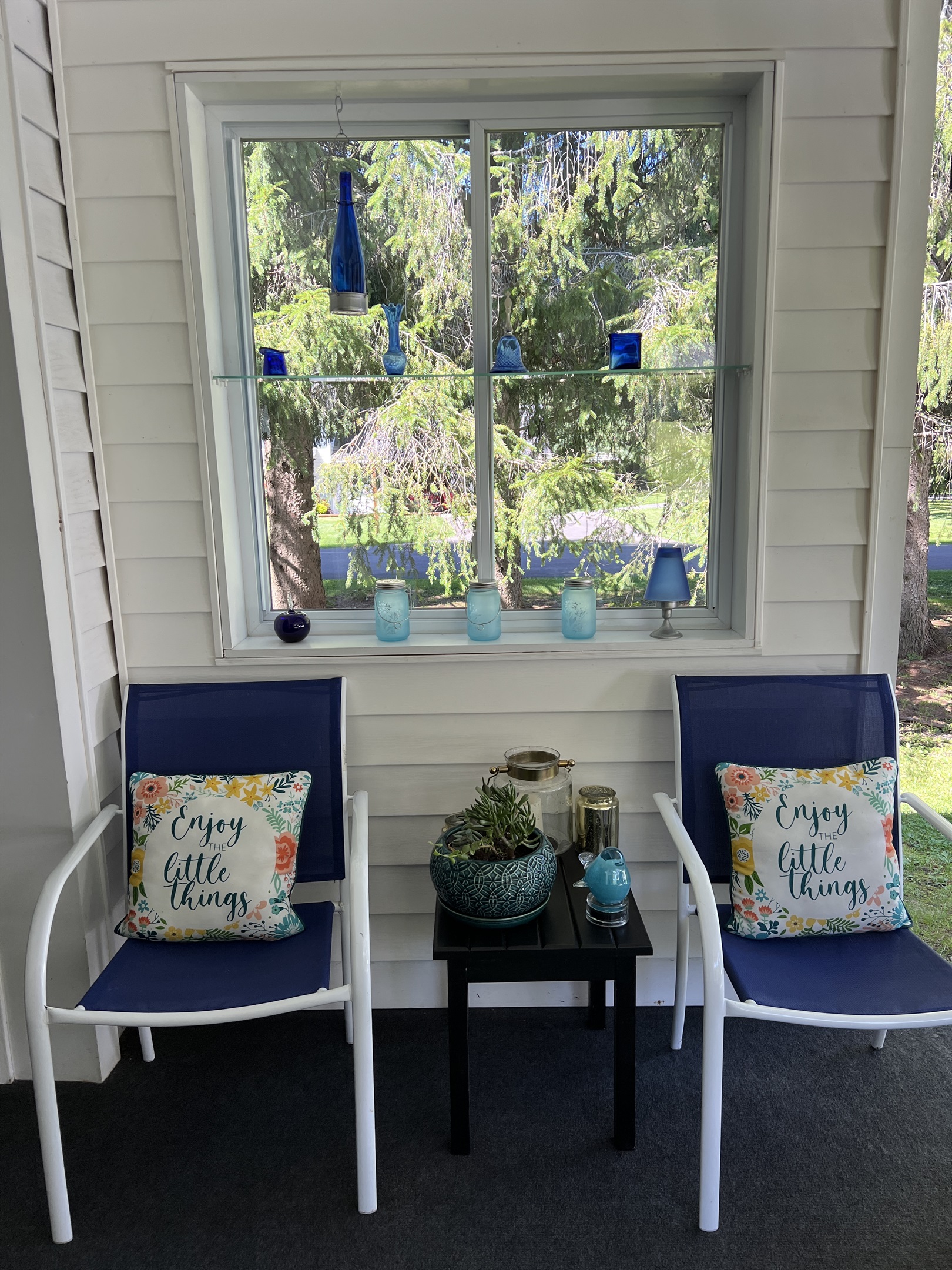 Outdoor room next to gardens and pool