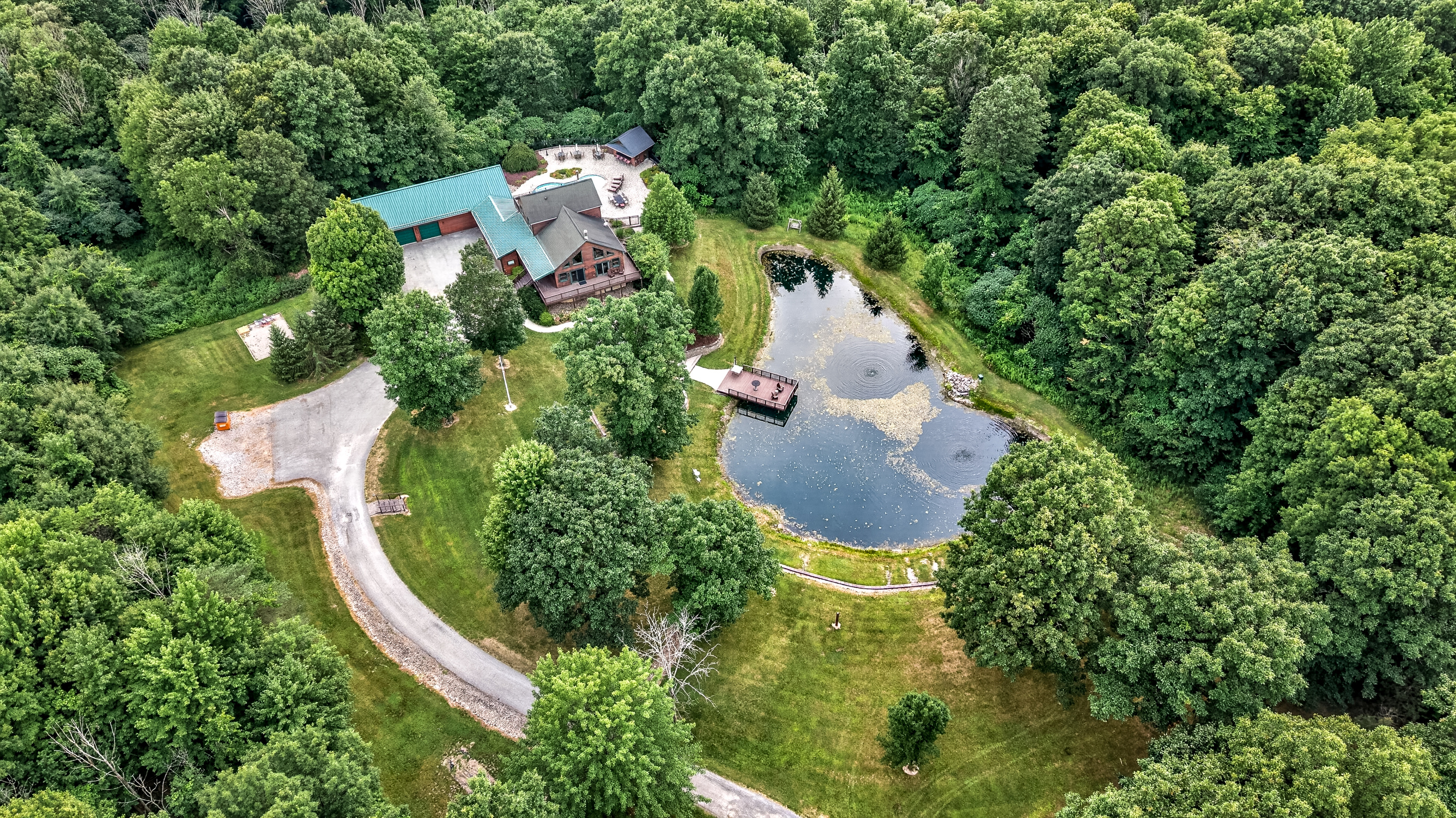 Aerial view of the pond and driveway