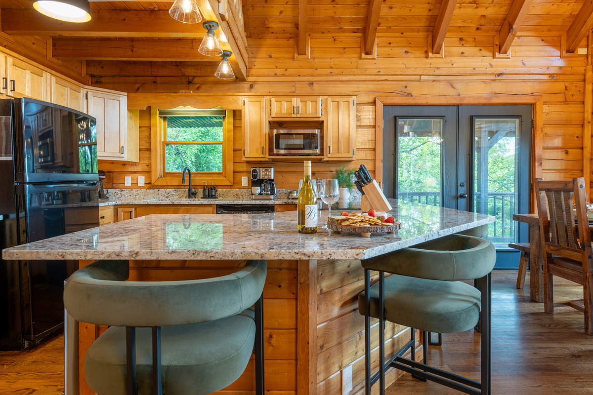 Counter seats for 4 guests on comfy chairs.