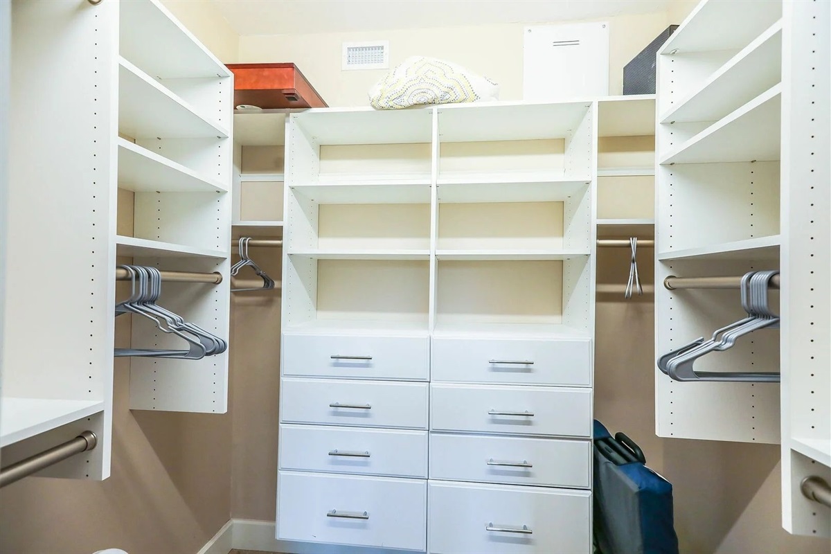 Walk-in closet with ample storage for extended stays.