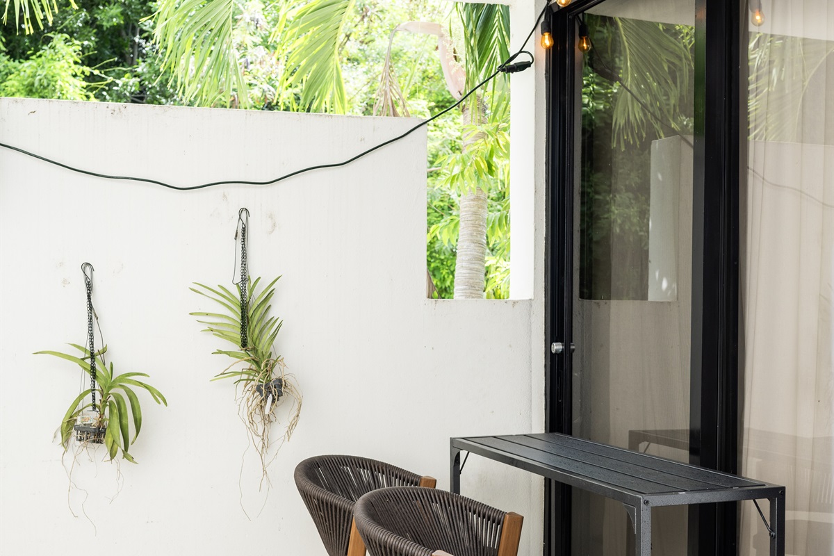 Evenings come alive with twinkling lights and lush surroundings.
