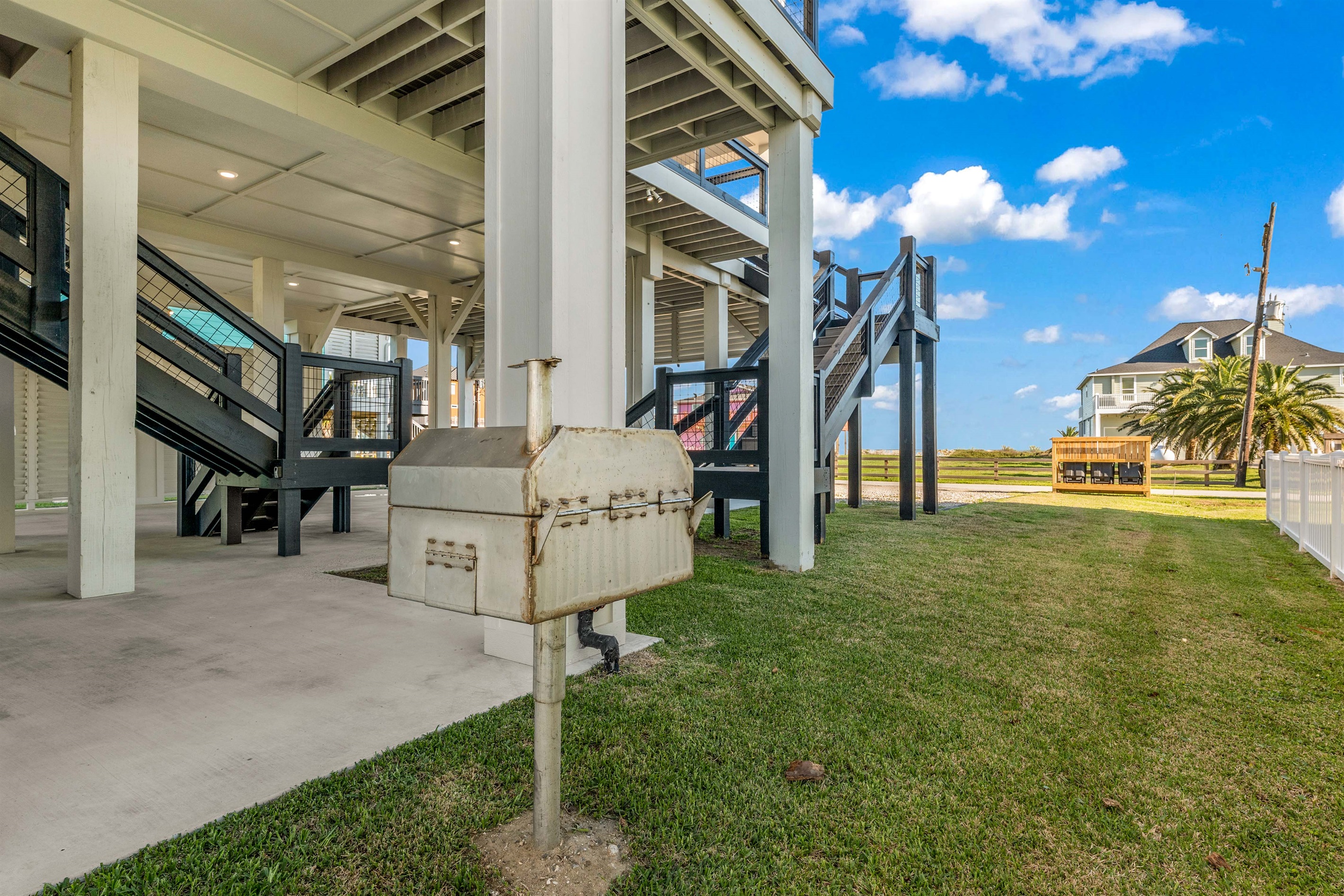 Costa Cristal Outdoor Space: A welcoming outdoor area featuring a private garage and generous yard space for added comfort and convenience.