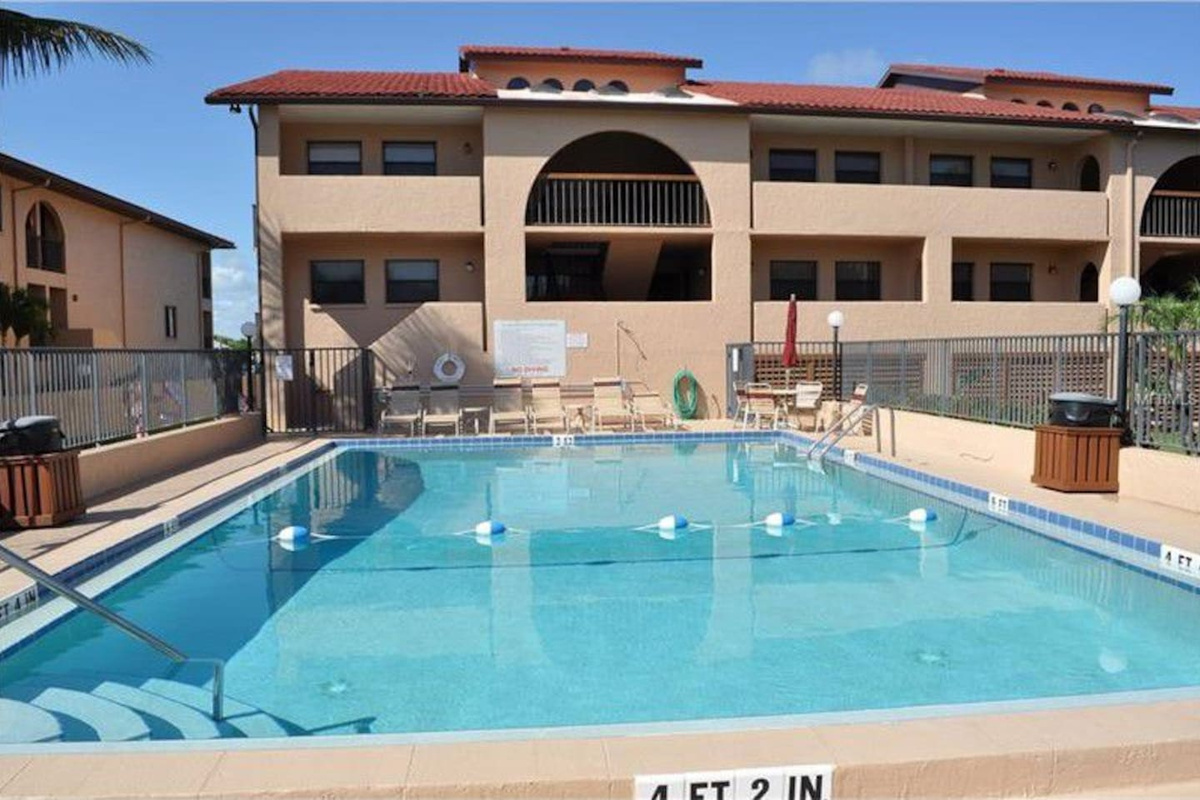 SWIMMING POOL WITH TOWNHOUSE VIEW