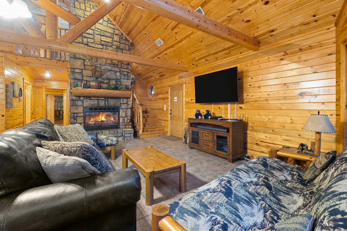 Living area with fireplace and cabin-style décor