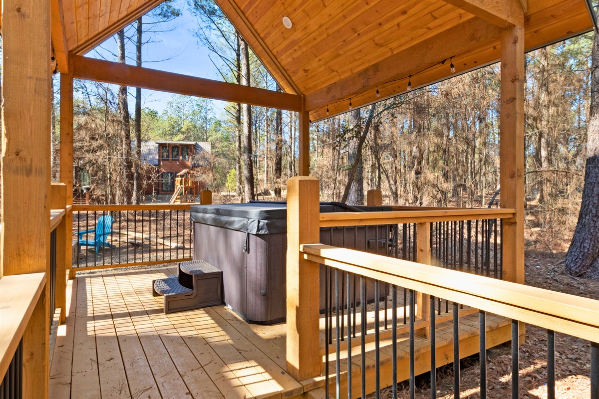 Soak your worries away! Our hot tub is waiting to bubble your cares away amid the trees