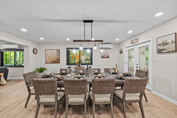 A comfortable dining table offering plenty of space for large family feasts