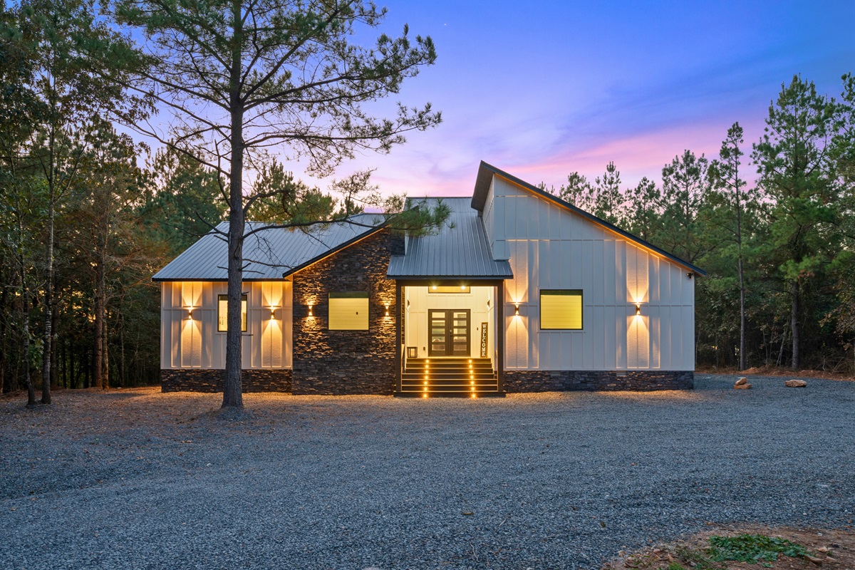 Clean lines, soft lighting, and a rustic-modern design make this cabin a true showstopper from every angle.