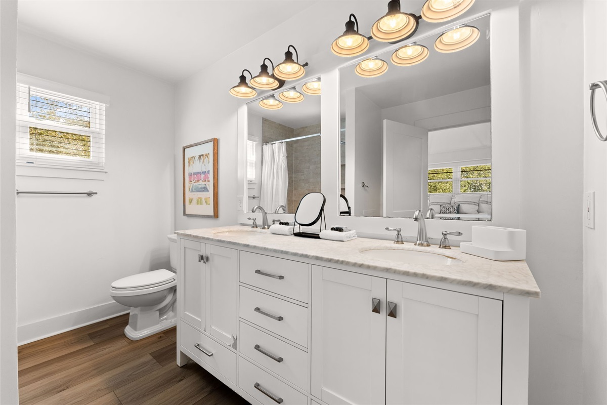 Side B Master: Private 3rd-floor ensuite with double vanity and walk-in shower