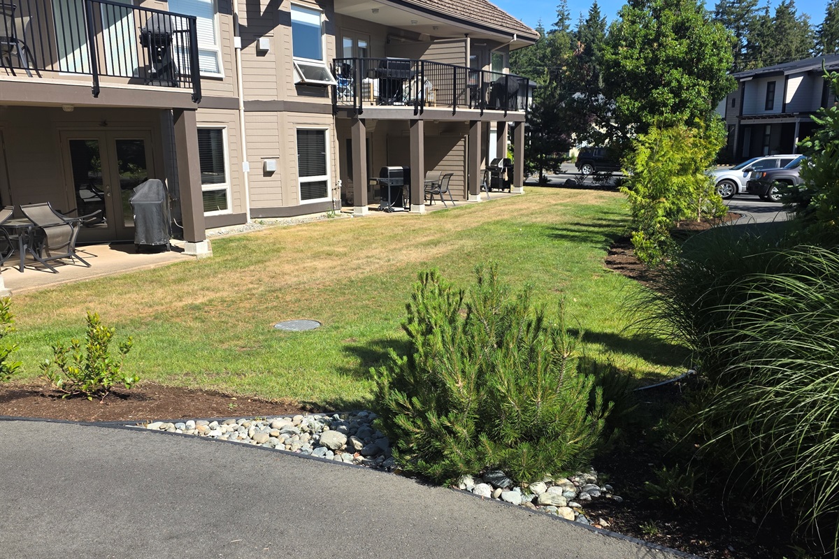 Unit A. Covered Patio. Natural Gas BBQ. Lots of green space.