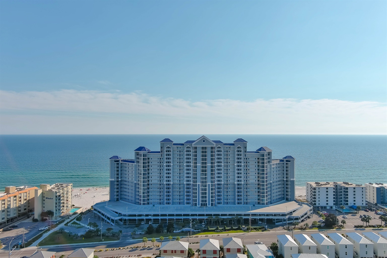 Experience ultimate coastal living at Lighthouse Condominiums, situated directly on the sugar-white sands of Gulf Shores, Alabama.