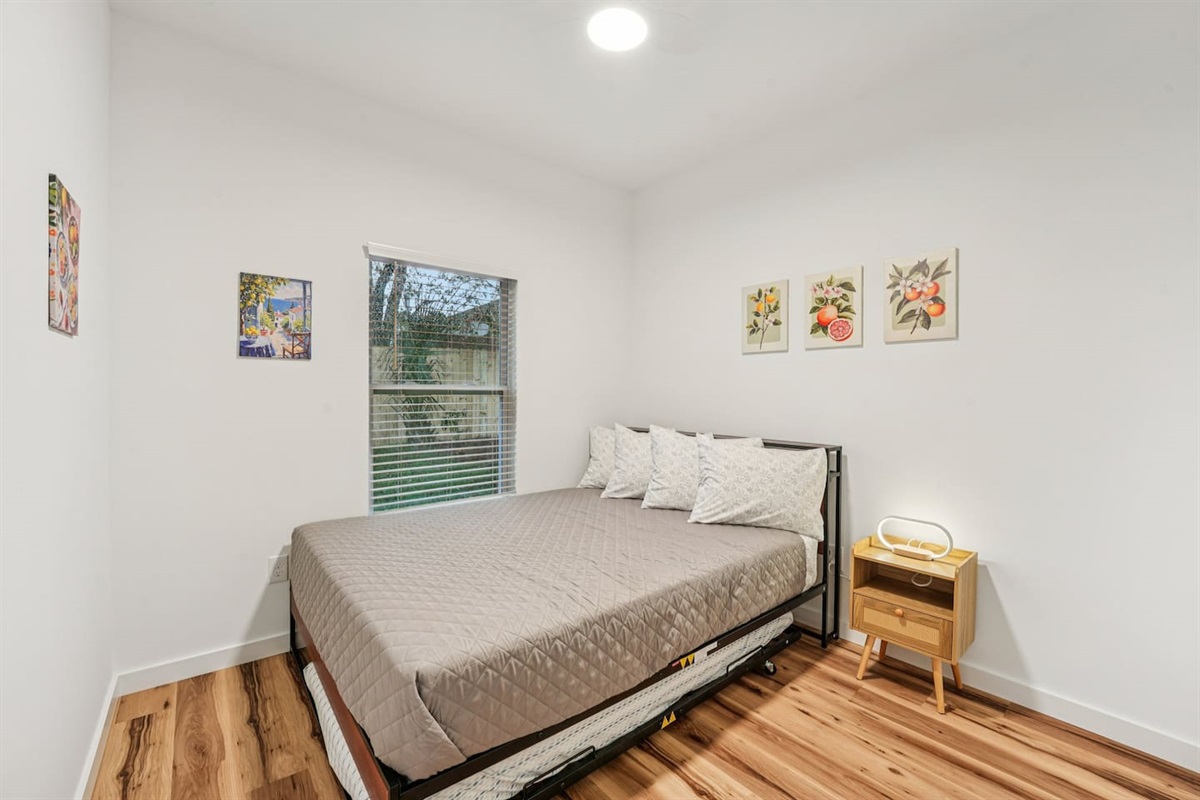 2nd bedroom has a Queen size bed, with a twin size trundle available underneath with extra blanket and pillow in the closet.