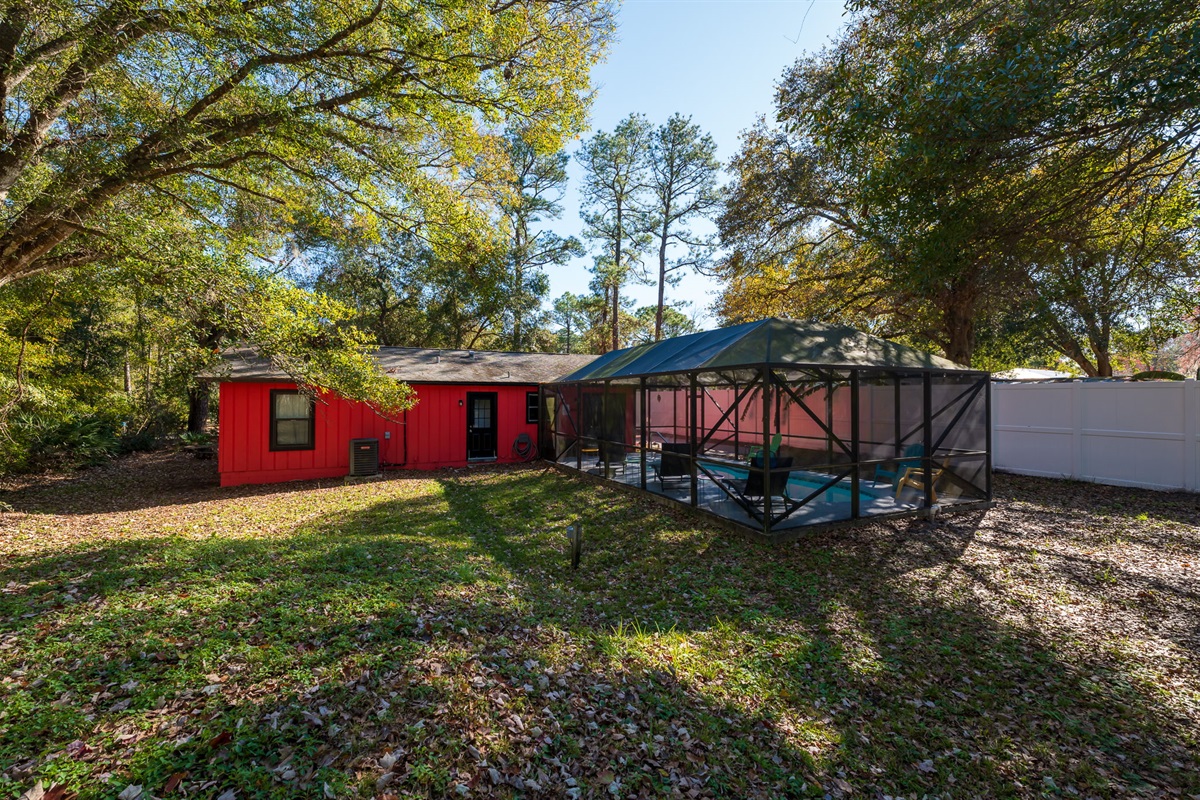 View of back yard and pool/lanai