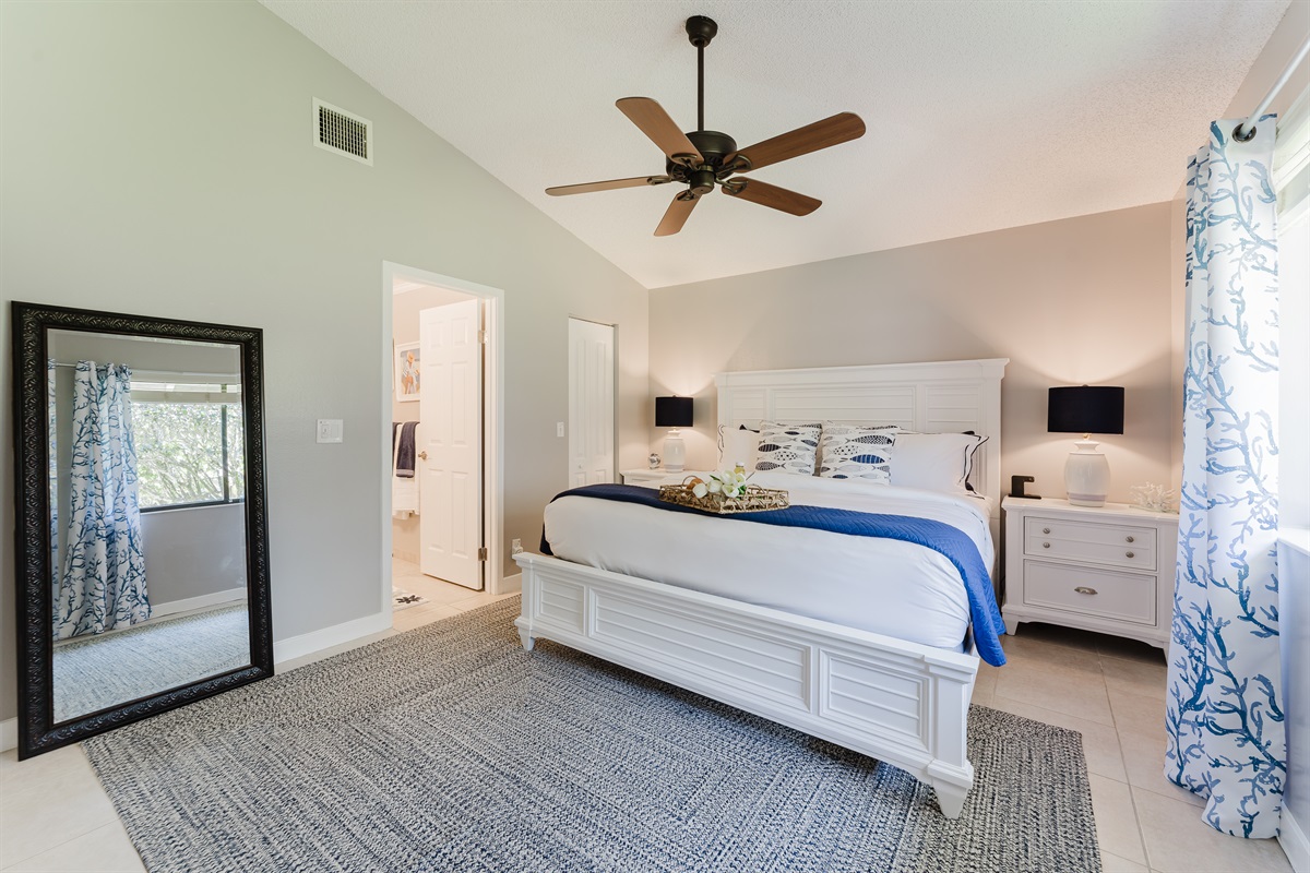 Spacious primary king suite featuring a walk-in closet and a beautifully updated ensuite bathroom—designed for comfort, relaxation, and a true vacation retreat feel
