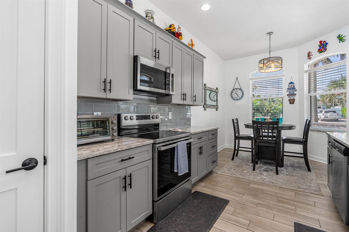 Upgraded and Fully Equipped Stainless Steel Kitchen with Dining Nook!