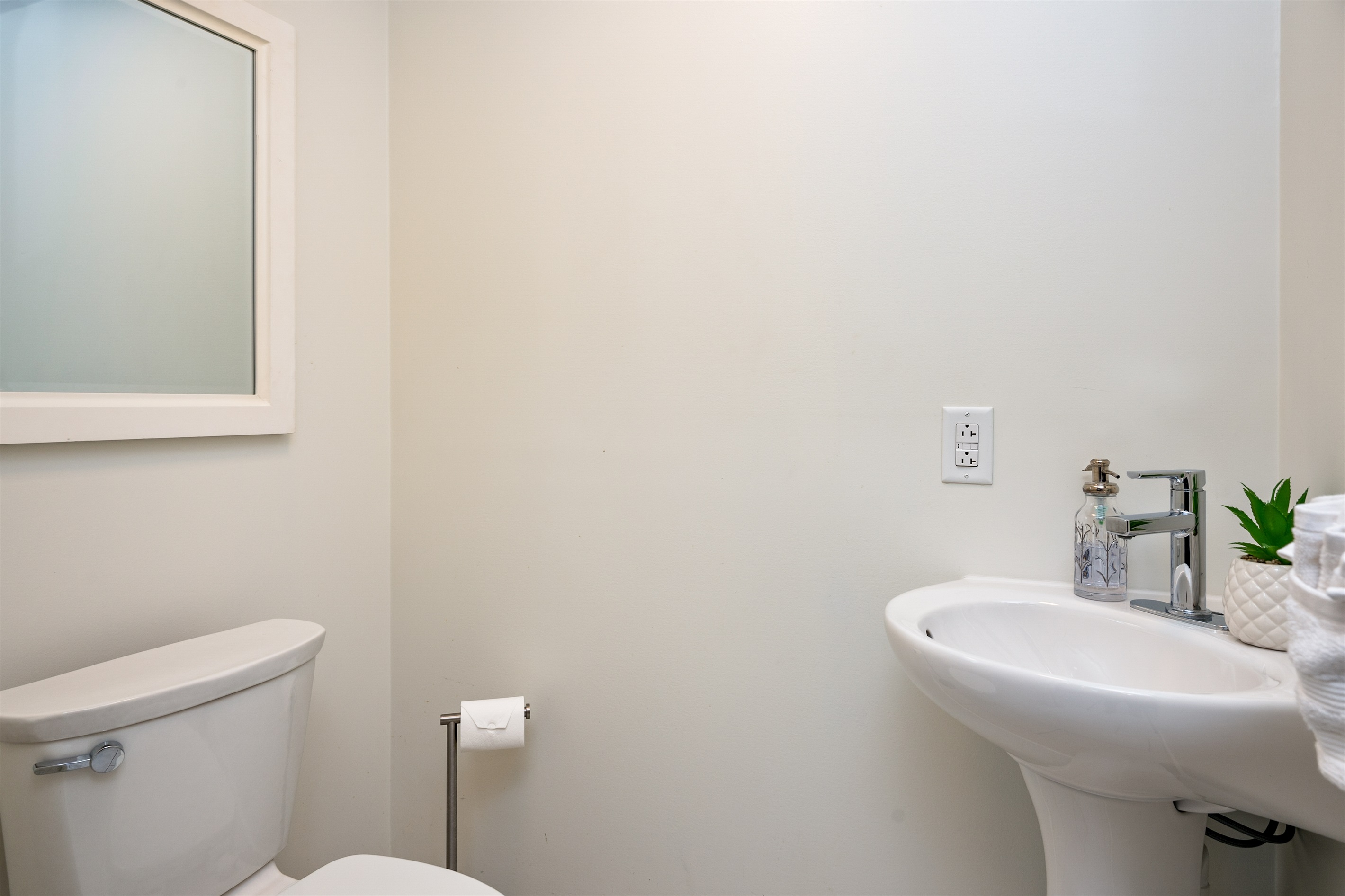 Clean and simple half bath with modern fixtures—perfect for quick fresh-ups 🚽✨