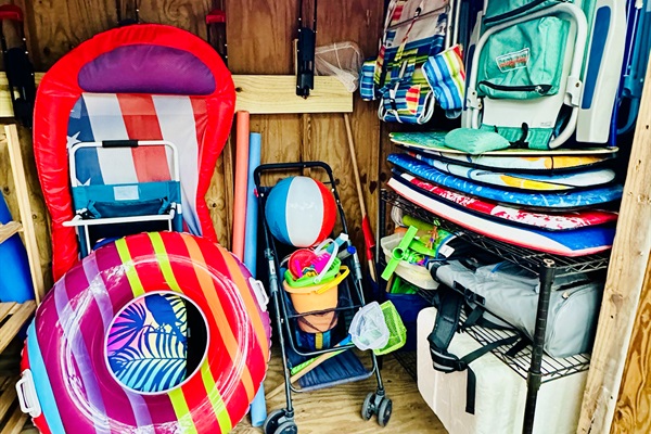 Beach Gear in Outdoor Shed for Guests to Use