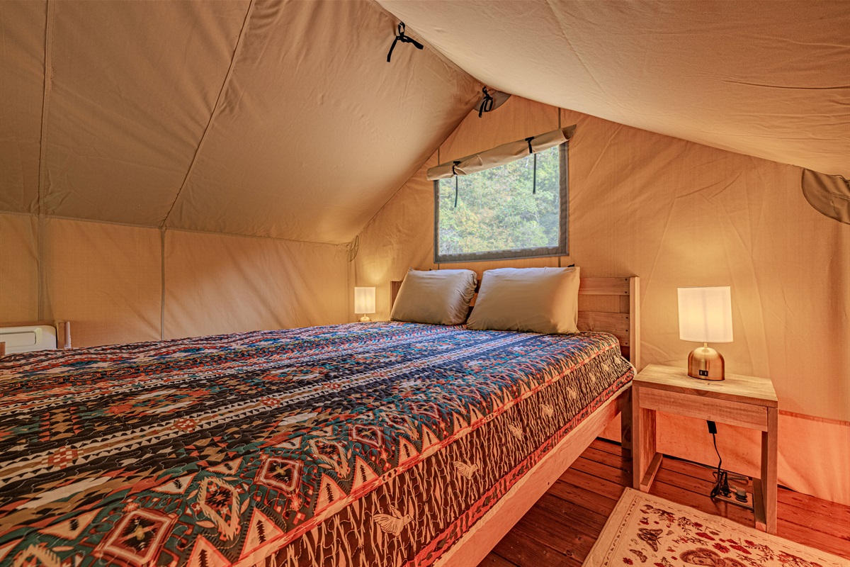 Sleep under canvas, but dream on a cloud. After a day of exploring, sink into your plush queen-sized bed, complete with soft linens and unique, vibrant decor.