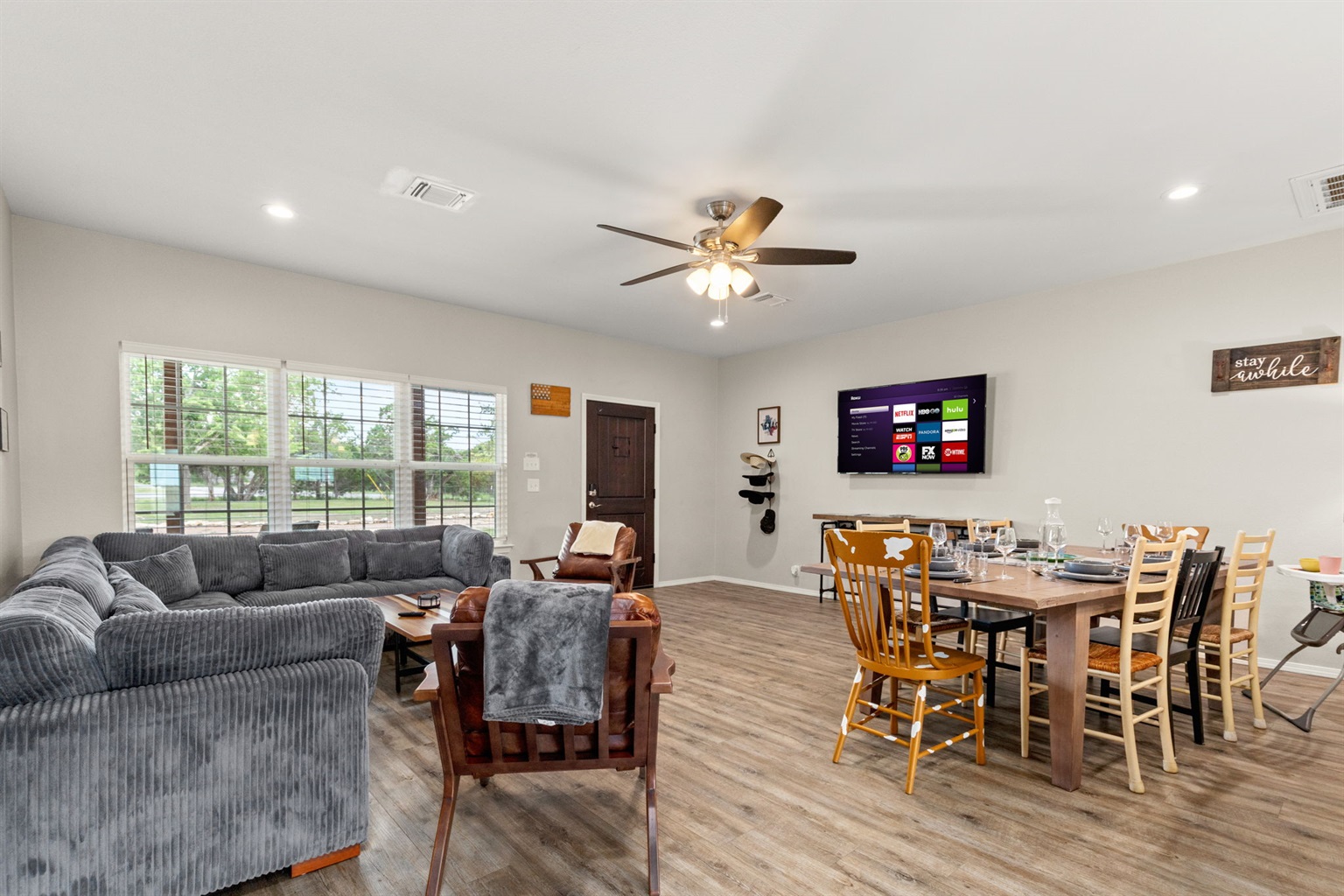 Spacious living area with Smart TV, comfy seating & good vibes