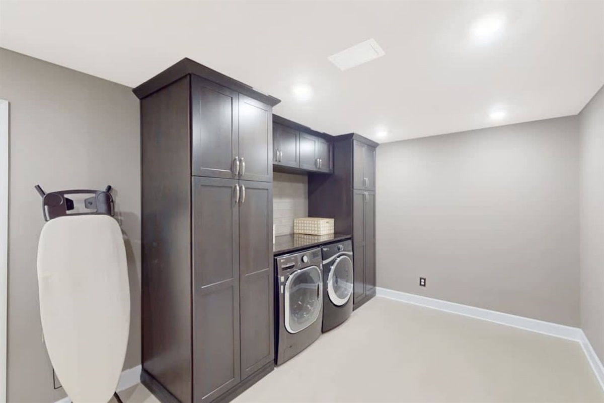 Fully equipped laundry room for effortless stays.