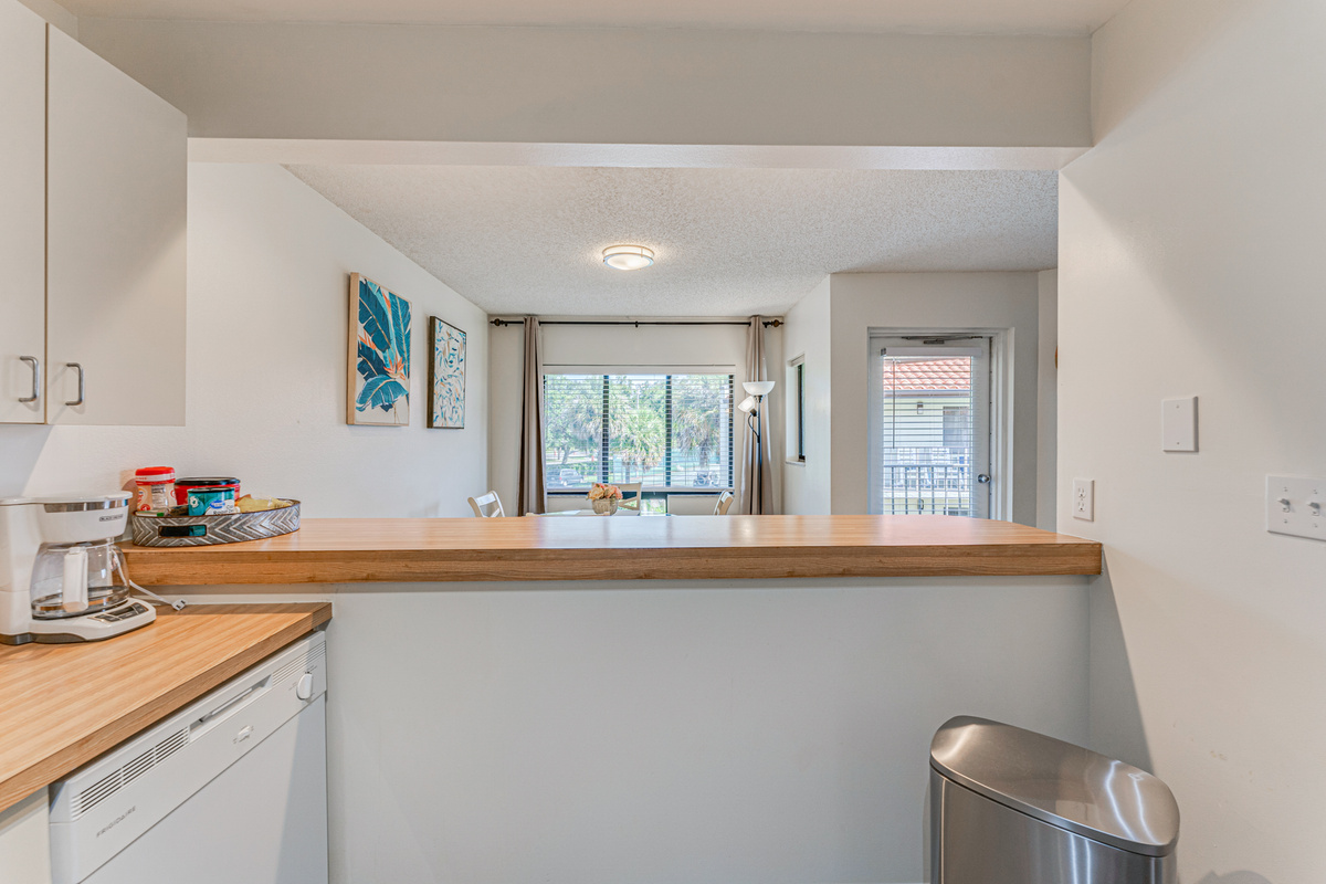 Fully equipped with modern appliances and essential cookware, the kitchen makes preparing meals easy&mdash;whether you're brewing your morning coffee or cooking a fresh seafood dinner.

